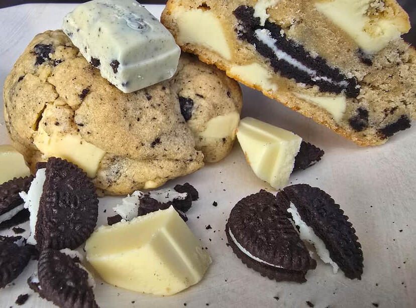A Giant Dreamy Cookies & Cream cookie loaded with real Oreo chunks and white chocolate cream filling- Crumbology handmade fresh in Mandurah & Peel region WA
